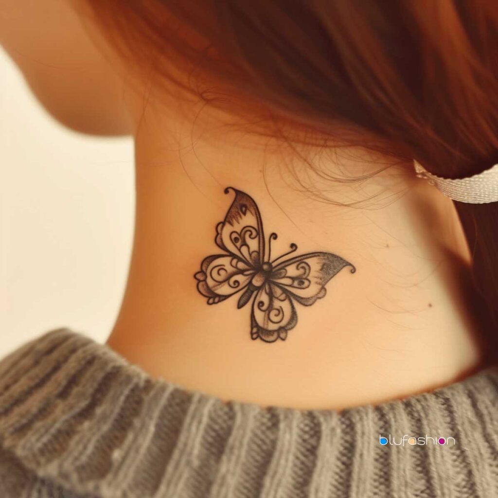 Charming filigree butterfly tattoo with intricate details on woman's neck.