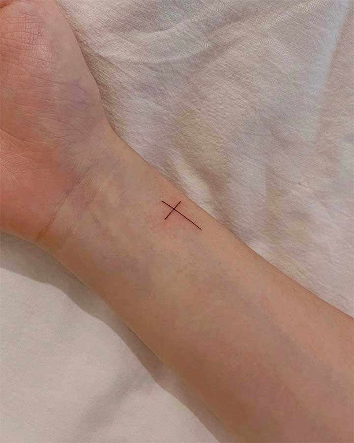 cross tattoos on wrist meaning