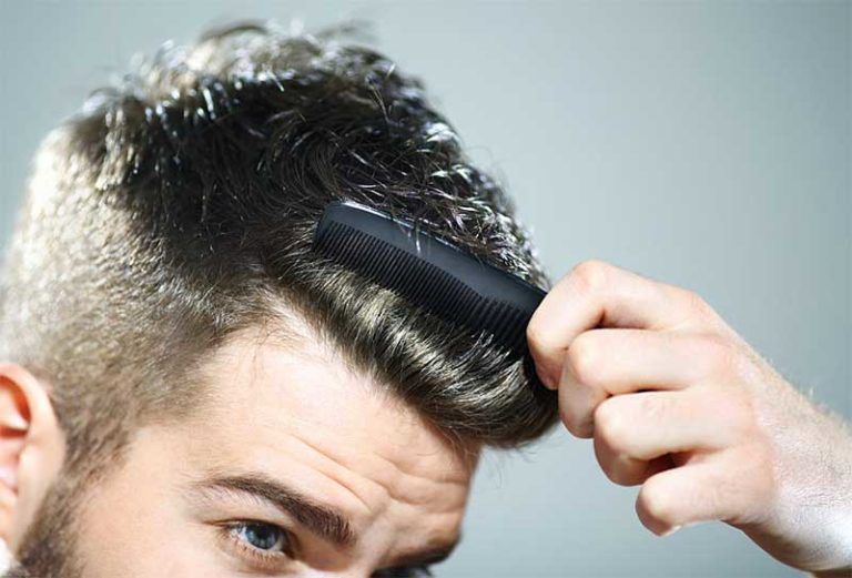 Male Styling His Hair