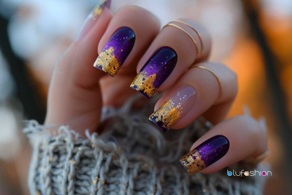 Purple and Gold Nail Designs: Purple ombre nails with gold glitter accents.