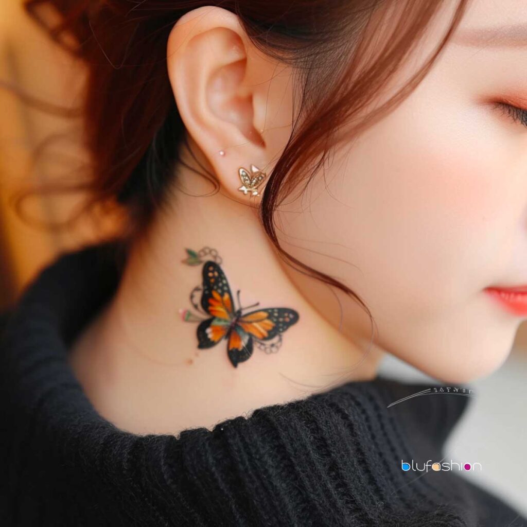 Colorful 3D butterfly tattoo on woman's neck with stud earring.