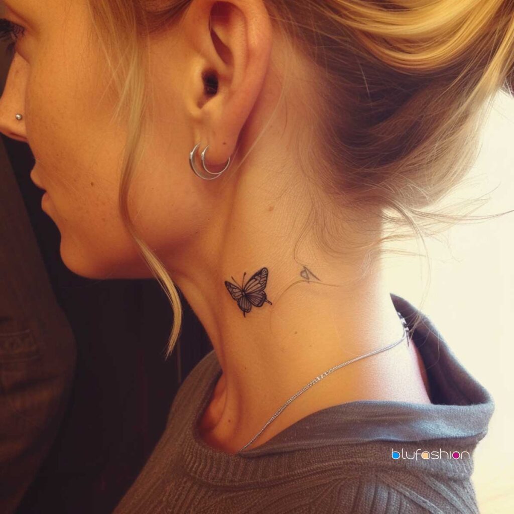 Minimalist small black butterfly tattoo on neck with hoop earring.