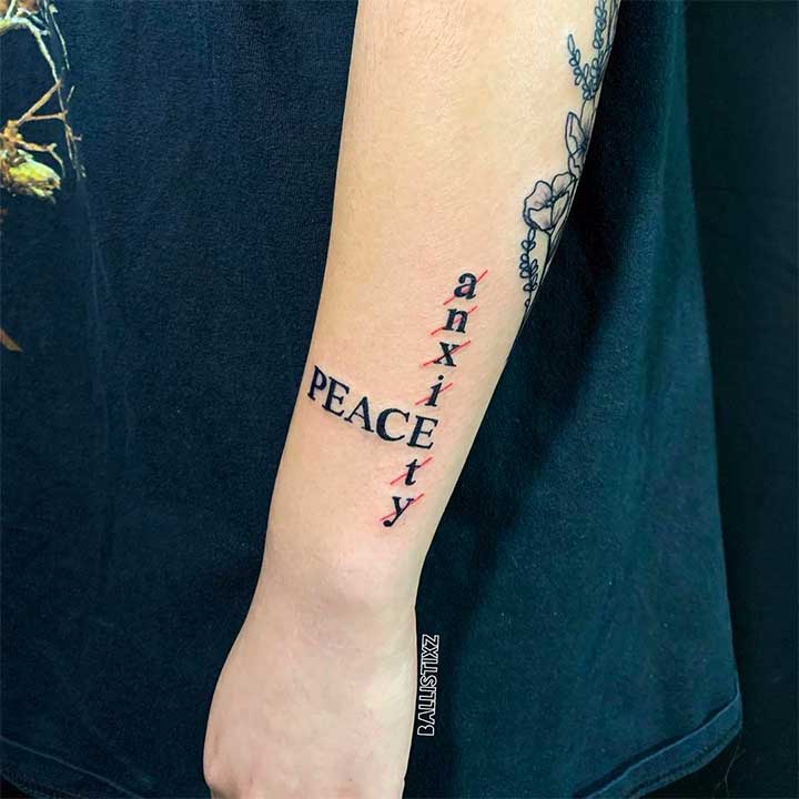 small peace sign tattoo