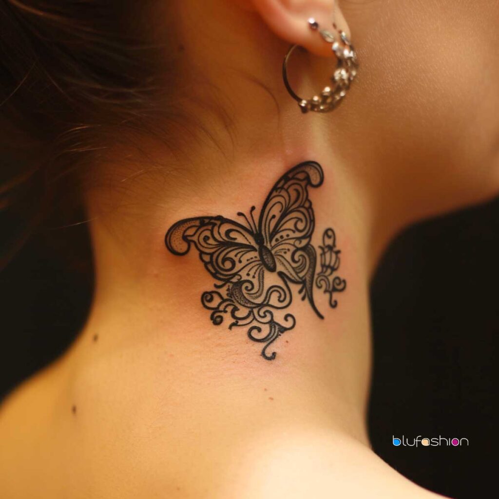 Black tribal butterfly tattoo on the neck with delicate swirls.