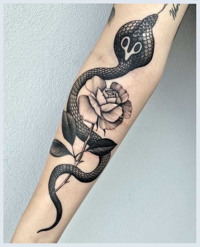 snake tattoos on arm